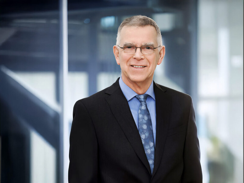 Business Foto Geschäftsmann, ein Portrait des Fotografen für Businessfotografie.