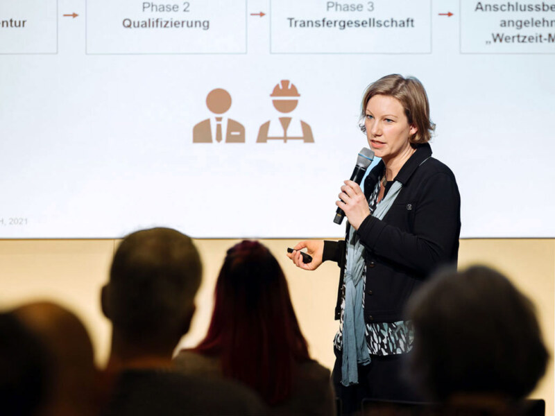 Vortrag vor Publikum. Event Foto des Kölner Eventfotografie für Eventfotografie.