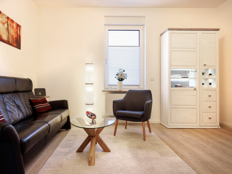 Das Wohnzimmer einer Ferienwohnung. Copyright: Architektur- und Ferienwohnung Fotografie Dirk Baumbach.