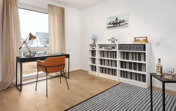 Das Arbeitsszimmer der Ferienwohnung. Ein professionelles Immobilienfoto des Immobilienfotografen.