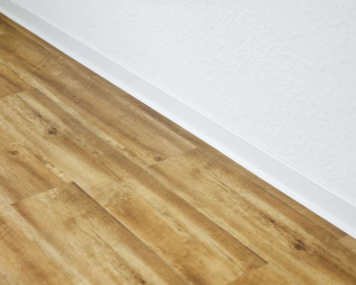 Fotografie von Bodenbelägen Der Bodenbelag in der neu renovierten Mietwohnung. Fotografie einer Wohnung in NRW.