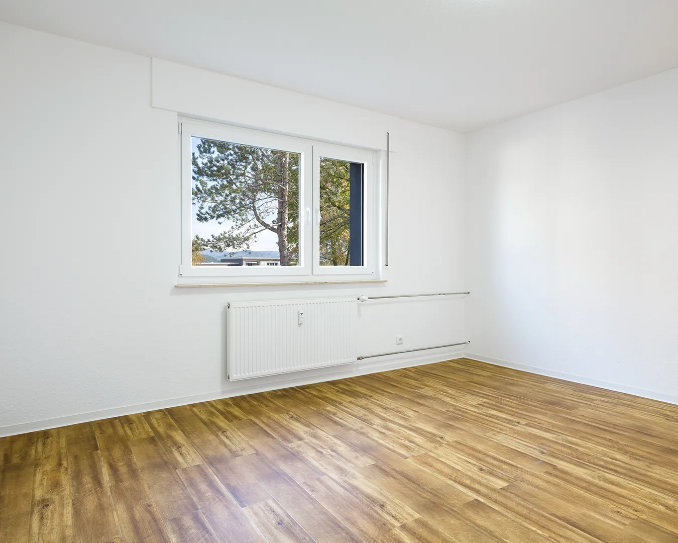 Immobilienfotografen | Mietwohnungen in NRW Das Schlafzimmer der Wohnung. Copyright: Immobilienfotografie Baumbach.